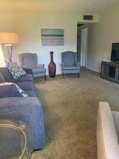 living room with carpet floors