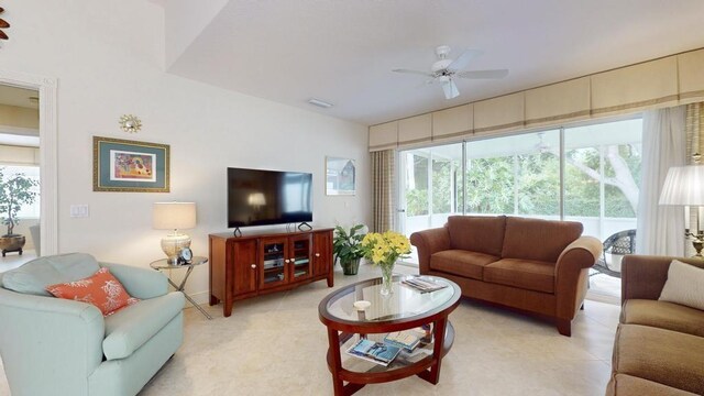 living room featuring ceiling fan