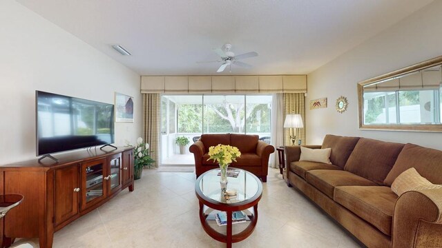 living room with ceiling fan