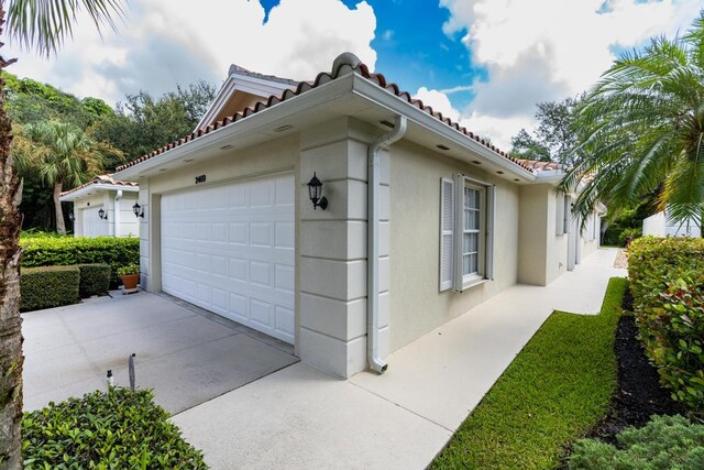 view of home's exterior featuring a garage