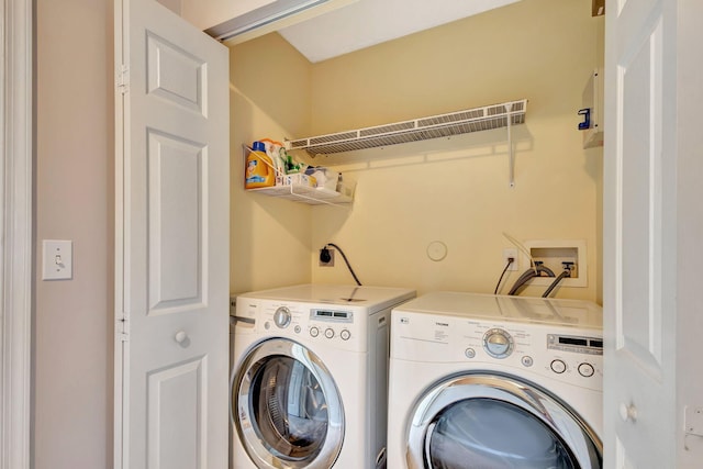 laundry room featuring washer and dryer