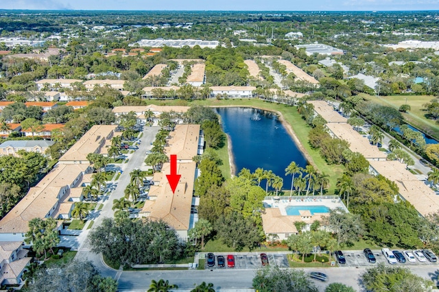 birds eye view of property featuring a water view