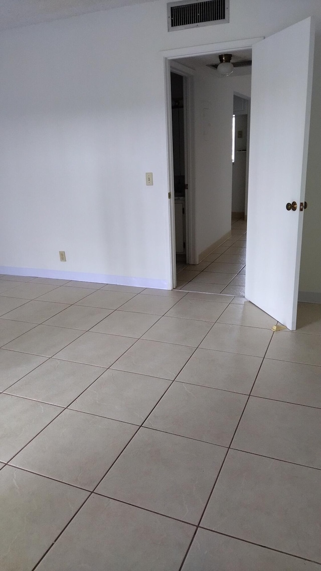 view of tiled spare room