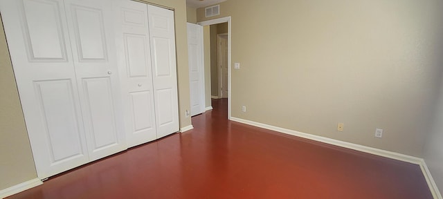 unfurnished bedroom featuring a closet