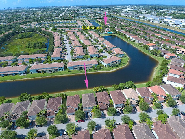 birds eye view of property featuring a water view