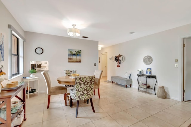 dining room with light tile patterned floors