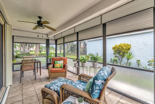 sunroom / solarium with ceiling fan