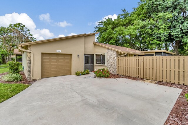 view of front of property featuring a garage