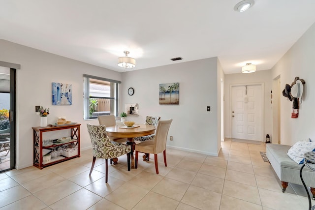 dining room featuring light tile patterned floors