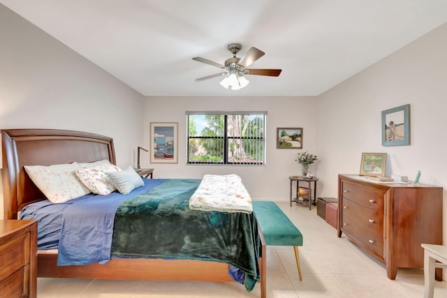 tiled bedroom with ceiling fan