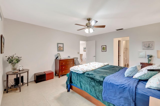 tiled bedroom featuring ceiling fan