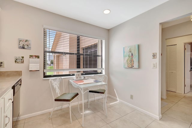 interior space with light tile patterned floors