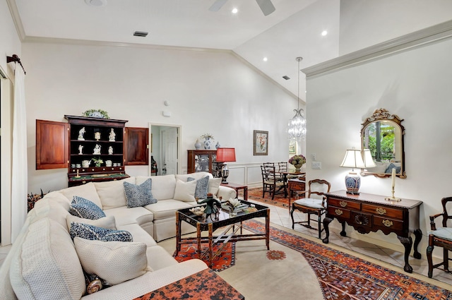 living room featuring crown molding, light hardwood / wood-style flooring, ceiling fan, and high vaulted ceiling