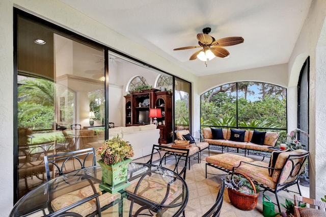 sunroom / solarium with ceiling fan