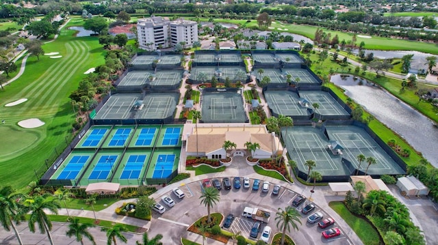 aerial view with view of golf course and a water view