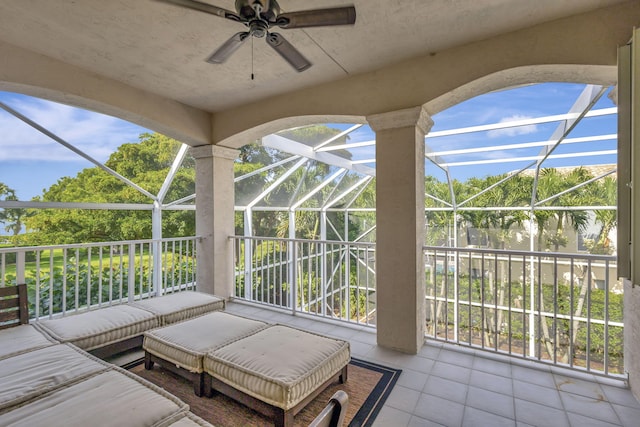 exterior space featuring ceiling fan and a patio area