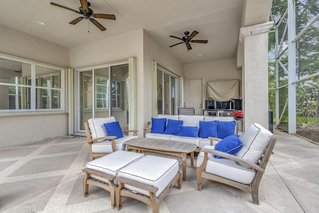 view of patio / terrace with outdoor lounge area, ceiling fan, and a lanai