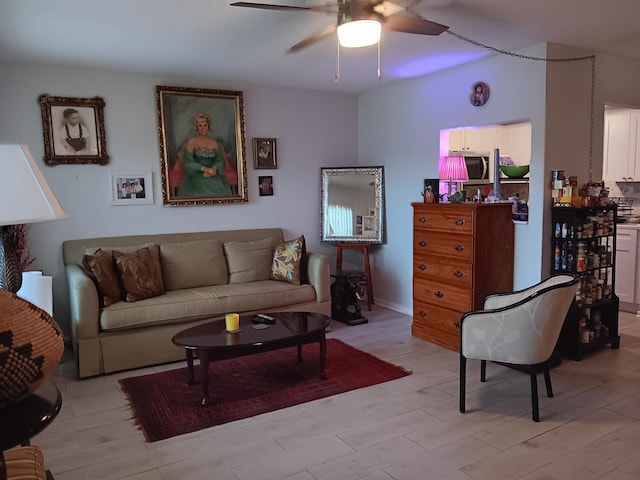 living room featuring ceiling fan