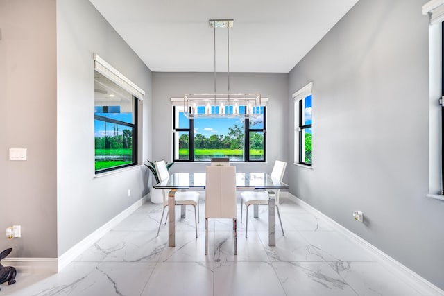 dining room with a wealth of natural light