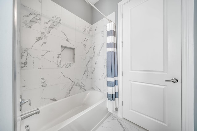 bathroom with shower / tub combo with curtain