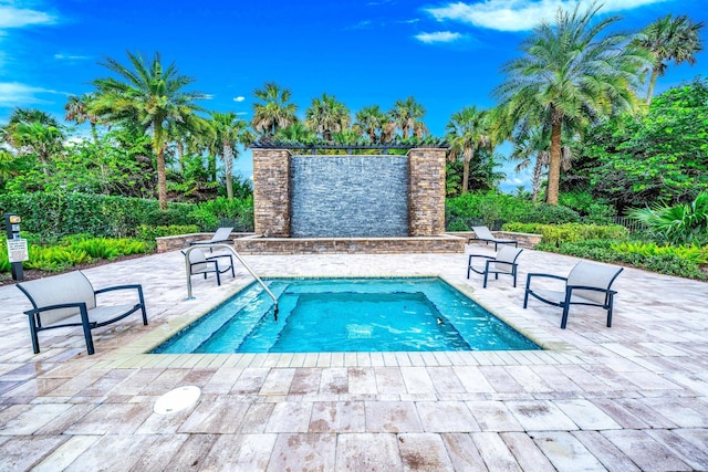 view of pool featuring a patio area