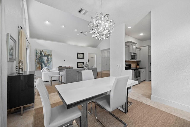 carpeted dining space with an inviting chandelier and vaulted ceiling