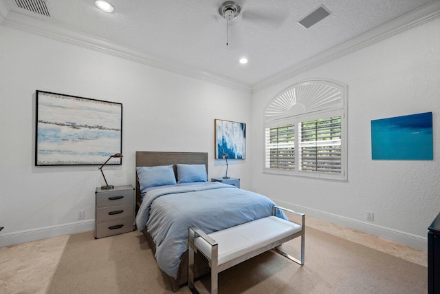 carpeted bedroom with crown molding, a textured ceiling, and ceiling fan