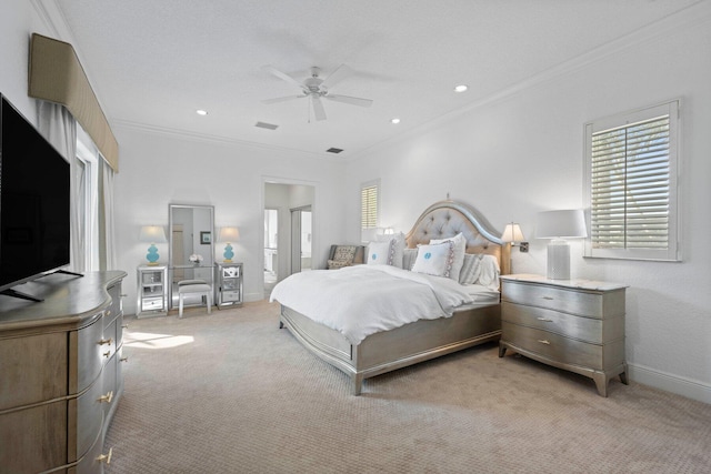 bedroom with ceiling fan, crown molding, and light carpet