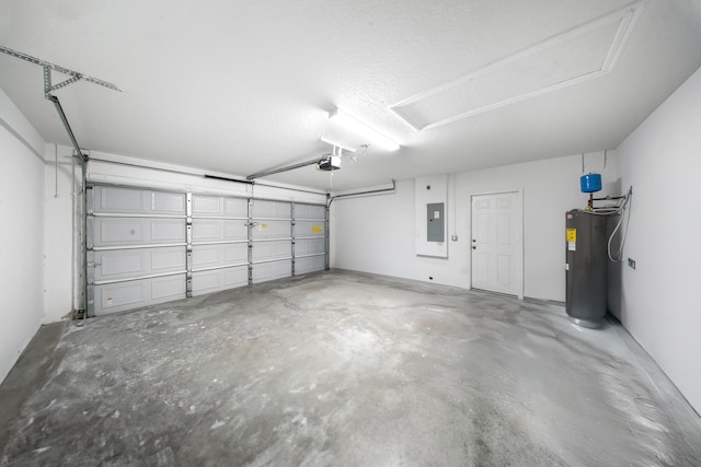 garage featuring electric water heater, a garage door opener, and electric panel