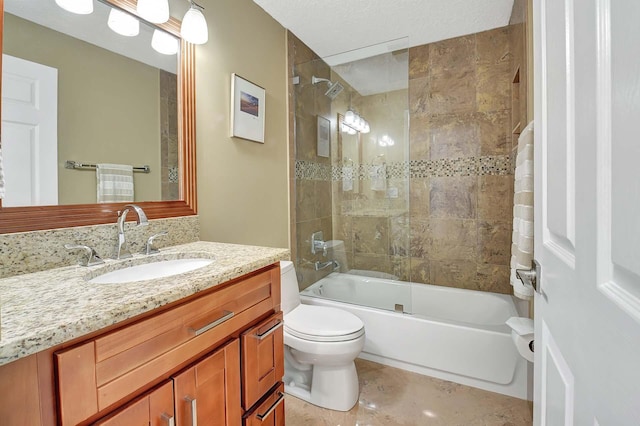 full bathroom with tiled shower / bath combo, vanity, and toilet