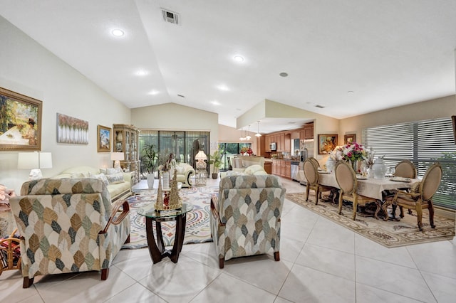 tiled living room with lofted ceiling