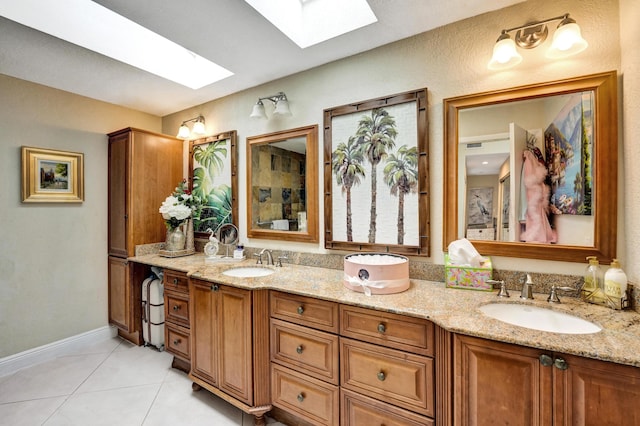 11111 Highland Cir, Boca Raton, FL 33428 - full bath with a skylight, double vanity, tile patterned floors, and baseboards