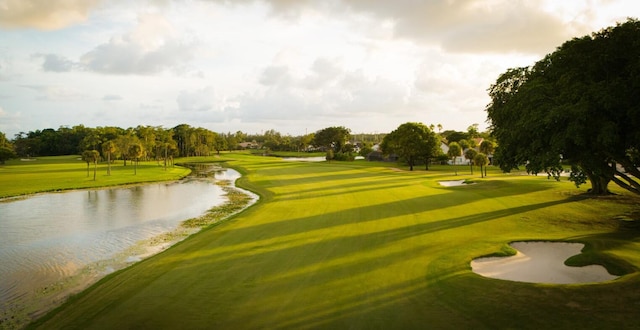 11111 Highland Cir, Boca Raton, FL 33428 - surrounding community with a water view, golf course view, a yard, and view of scattered trees