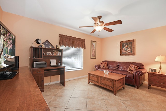 tiled living room featuring ceiling fan