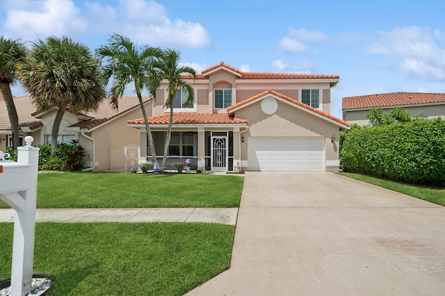 mediterranean / spanish-style home featuring a front yard