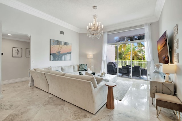 living room with ornamental molding and a chandelier