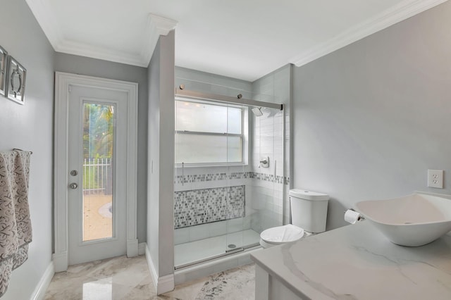 bathroom with an enclosed shower, toilet, crown molding, and vanity