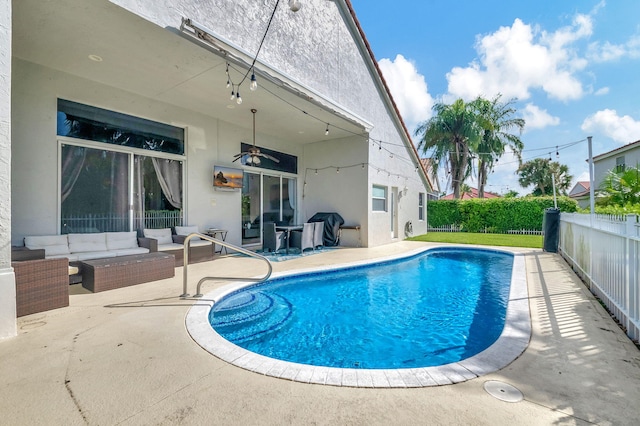 view of pool with a fenced in pool, an outdoor hangout area, a patio area, a grill, and a fenced backyard