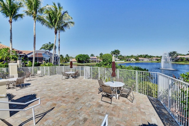 view of patio featuring a water view