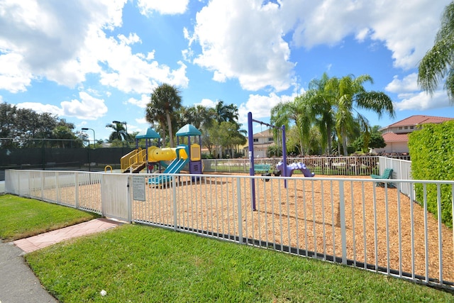 view of play area featuring a lawn