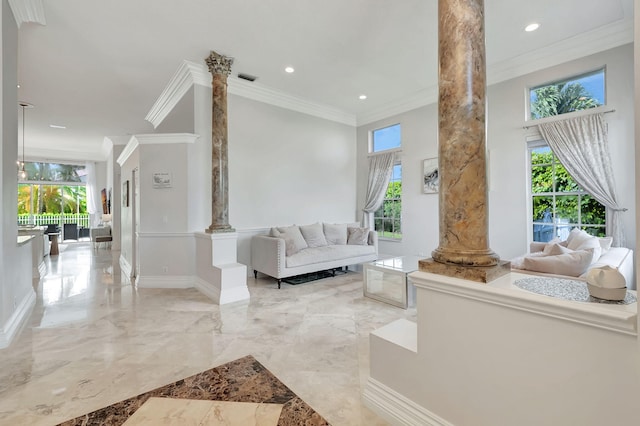 interior space with ornate columns, plenty of natural light, marble finish floor, and ornamental molding