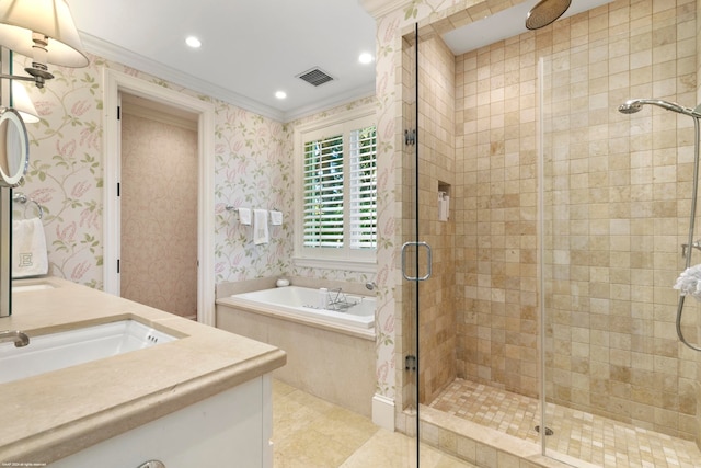 bathroom with plus walk in shower, tile patterned flooring, ornamental molding, and vanity