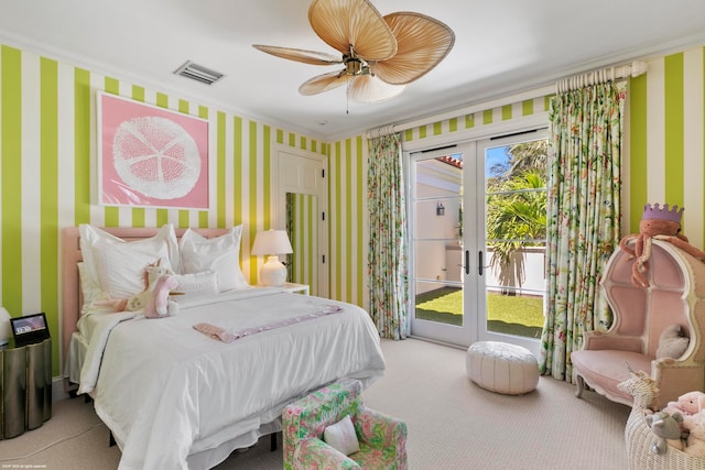 carpeted bedroom featuring multiple windows, ceiling fan, access to exterior, and french doors