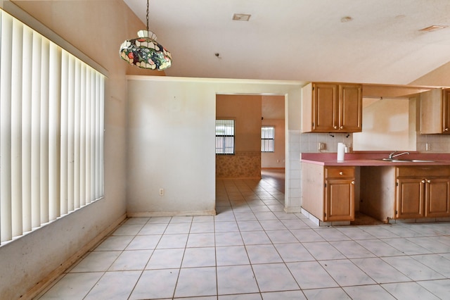 kitchen with sink and light tile patterned floors