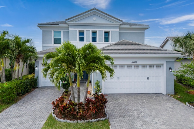 view of front of property with a garage