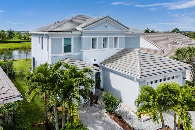 view of front of property featuring a water view