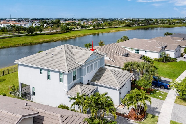 drone / aerial view with a water view