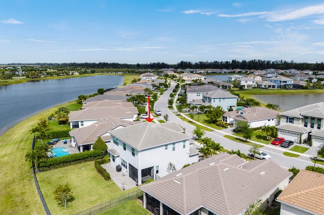 drone / aerial view featuring a water view