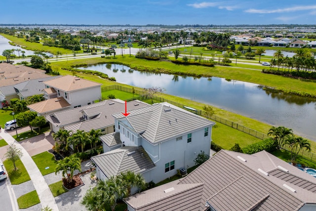 bird's eye view with a water view