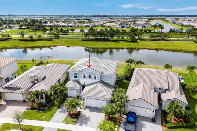 drone / aerial view featuring a water view